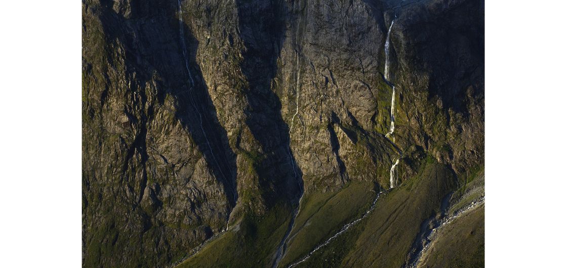 rock face and waterfalls 