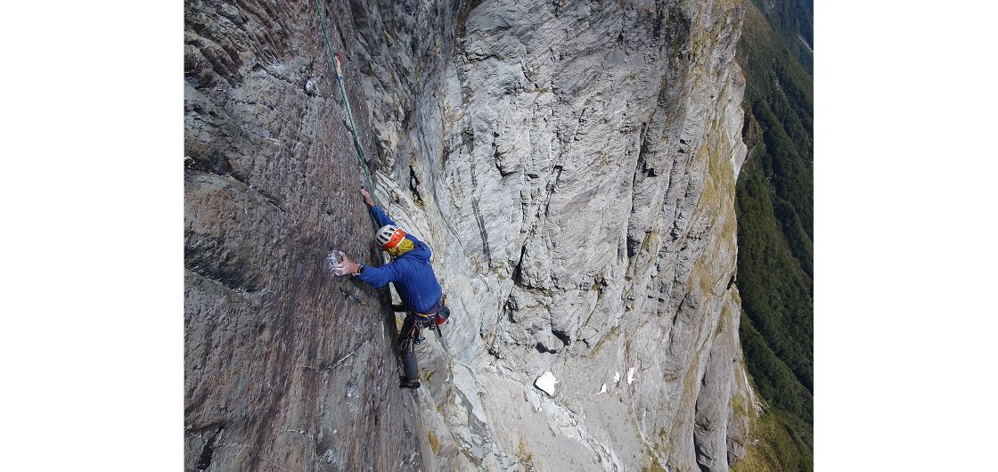 Climber on big rock wall