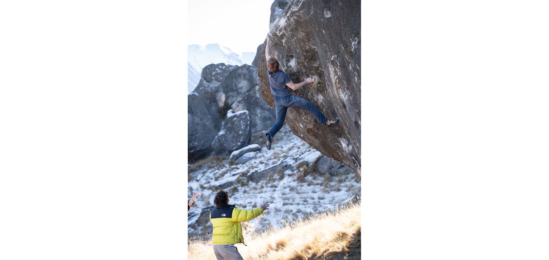 Climber on large boulder