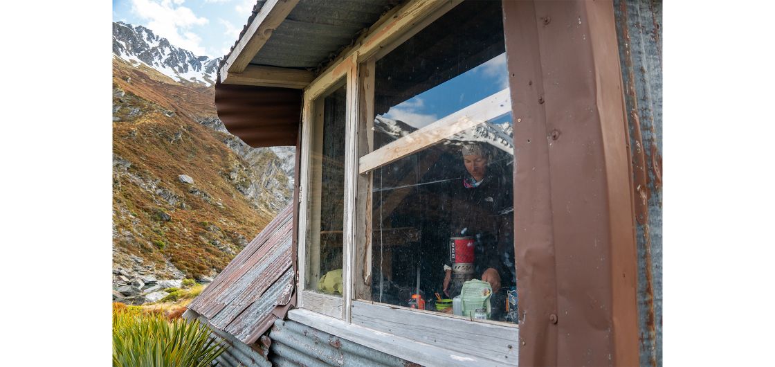 person inside a alpine hut