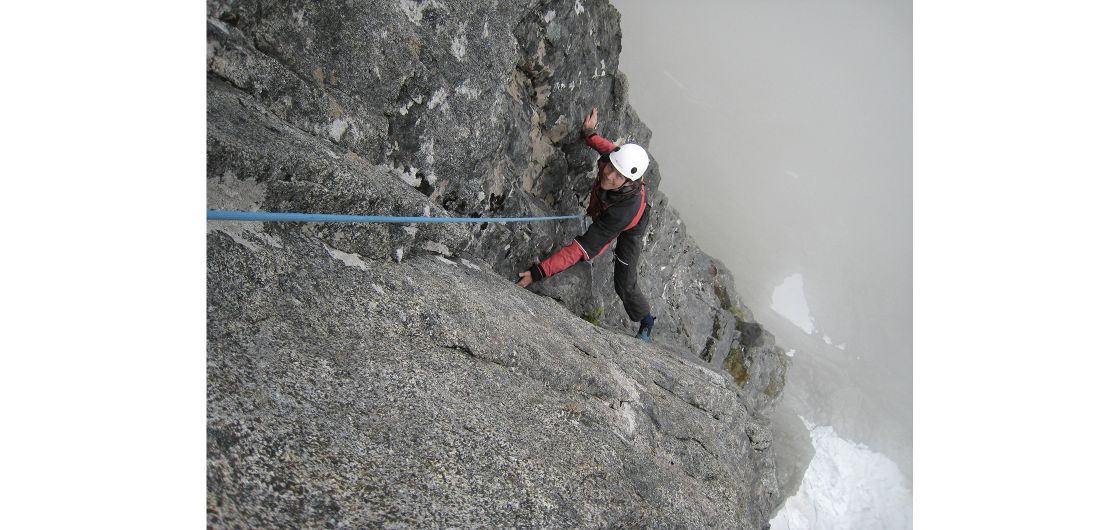 Climber on big rock route