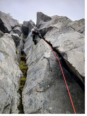 Climber on wide crack route