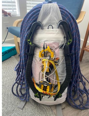 Small climbing pack with gear loaded