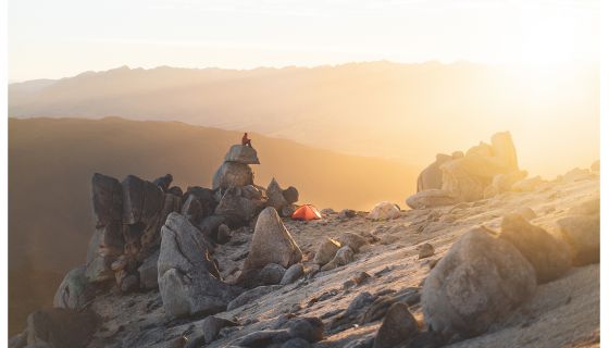 Late evening camping scene in the alpine