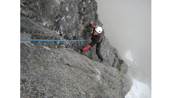 Climber on big rock route
